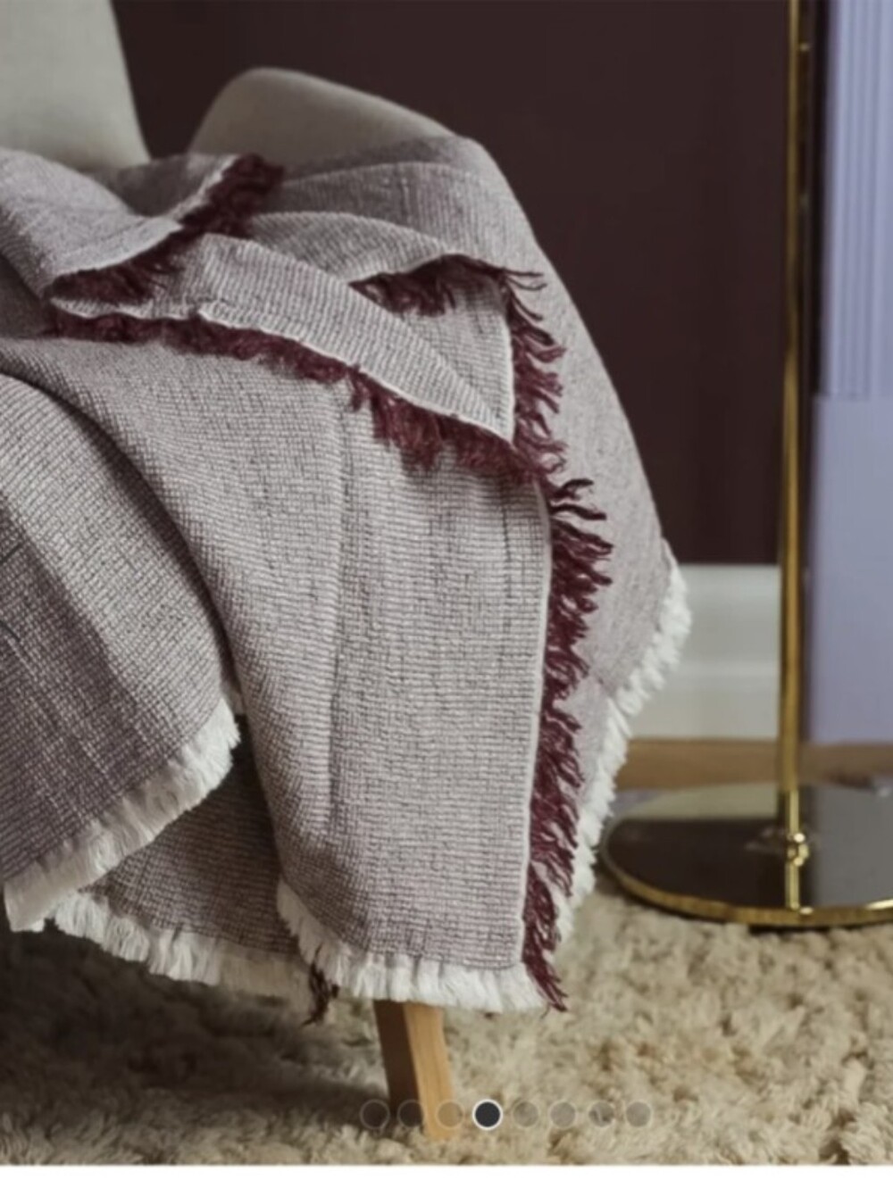 50 by 70 Elvang daisy throw blanket in deep red cotton linen blend